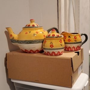 Tea set with sugar and milk server